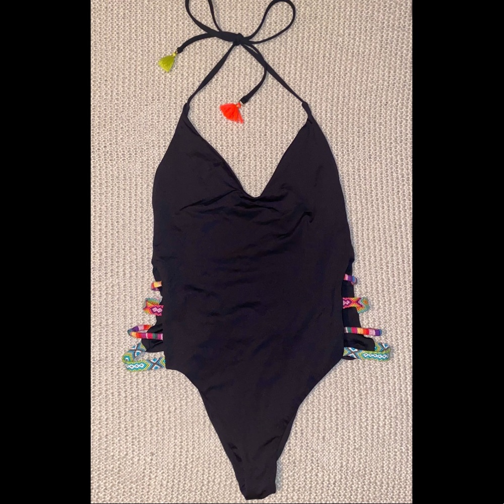 Black one piece w/ tribal colored detail on sides